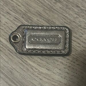 Coach Metallic Silver mini Leather Key Tag Charm